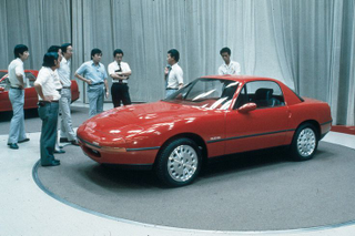 Mazda engineers around an MX-5 design prototype. Photo credit Mazda
